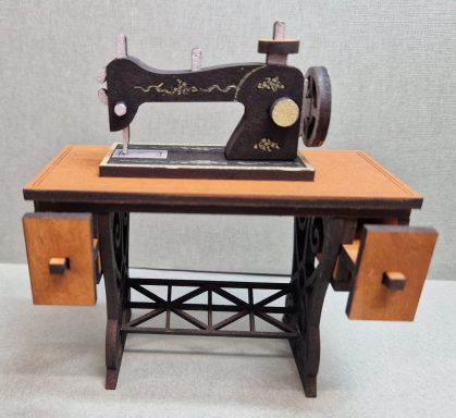 Miniature vintage sewing machine